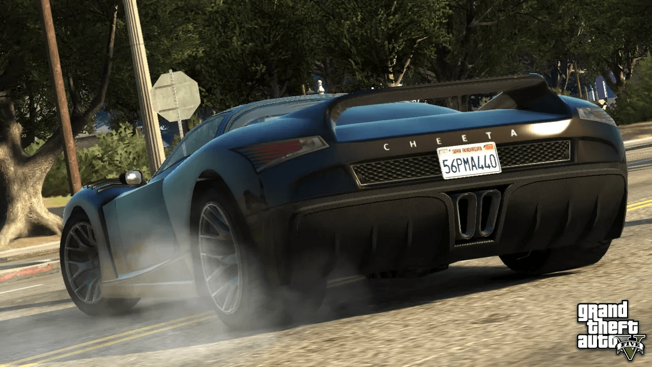 A red supercar speeding along a Los Santos highway in GTA 5