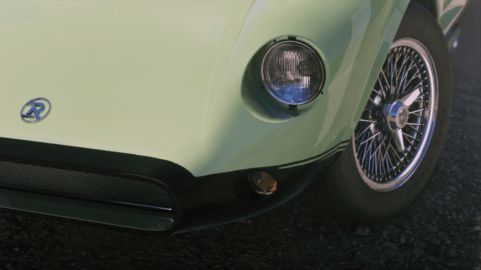 A vintage green sports car parked on a Vice City road in GTA 6