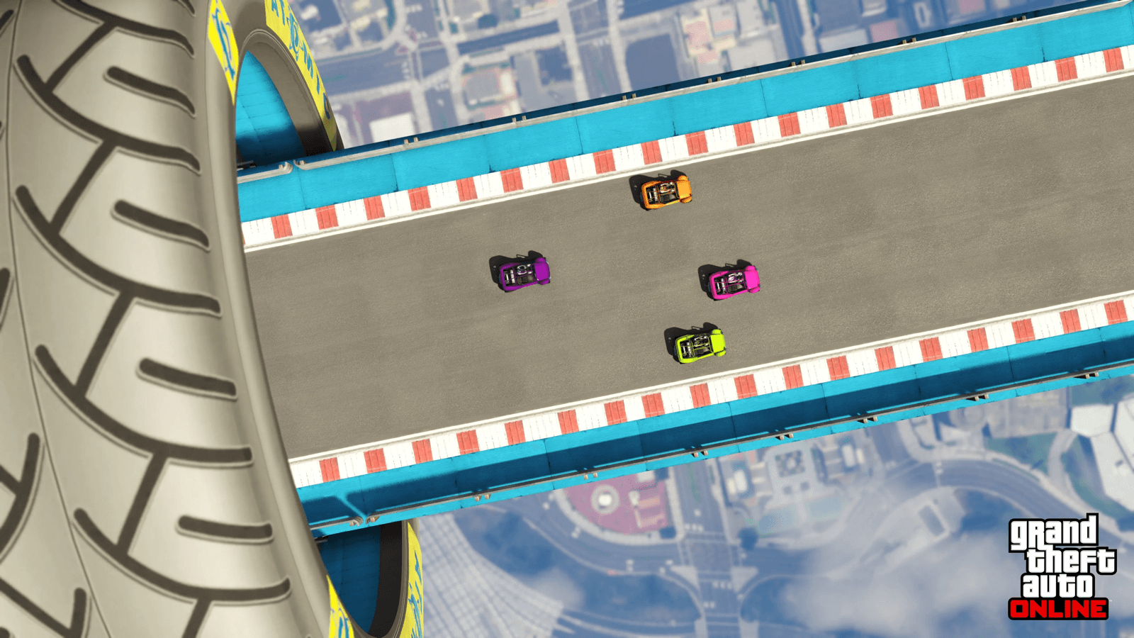 Cars racing on an elevated Hotring circuit high above Los Santos in GTA Online