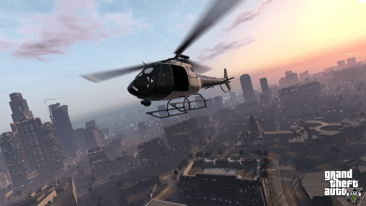 A police helicopter flying over the Los Santos skyline at sunset in GTA 5, official screenshot