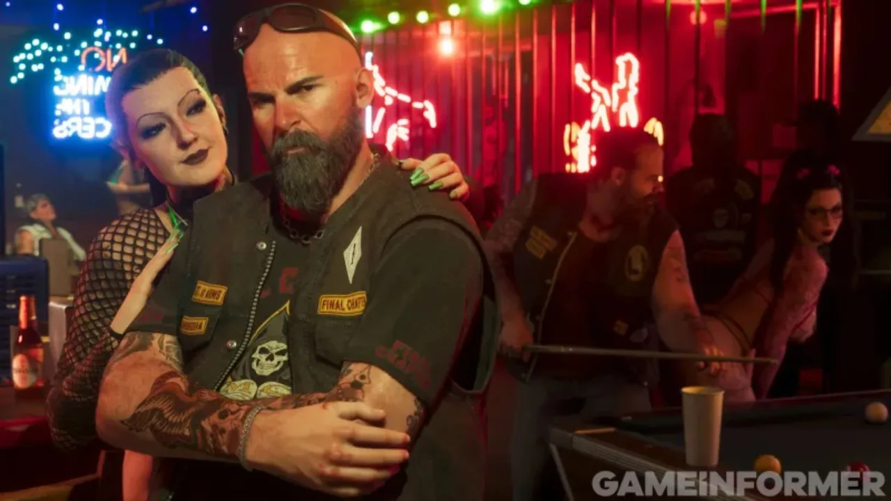 New GTA 6 screenshot: a bearded biker in a patched vest stands with a woman in a neon-lit bar, with other bikers around a pool table