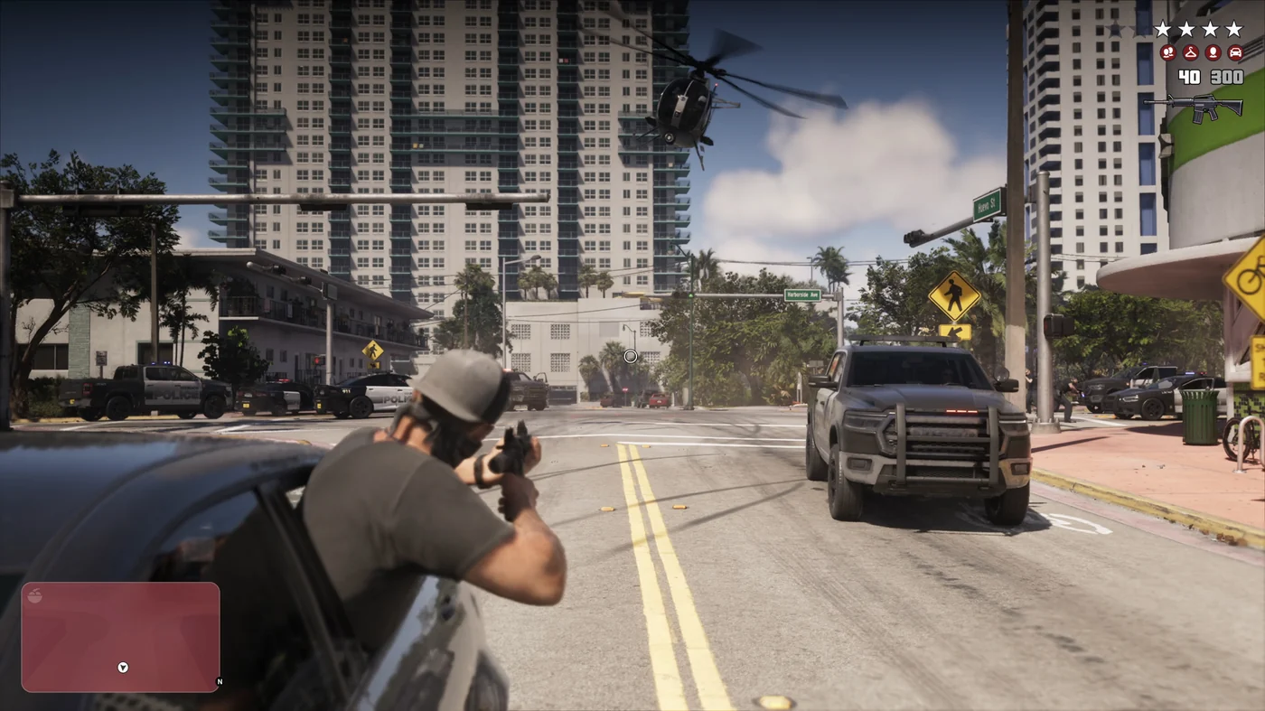 Jason leaning out of a moving car firing a carbine at a police pickup truck while a helicopter follows overhead