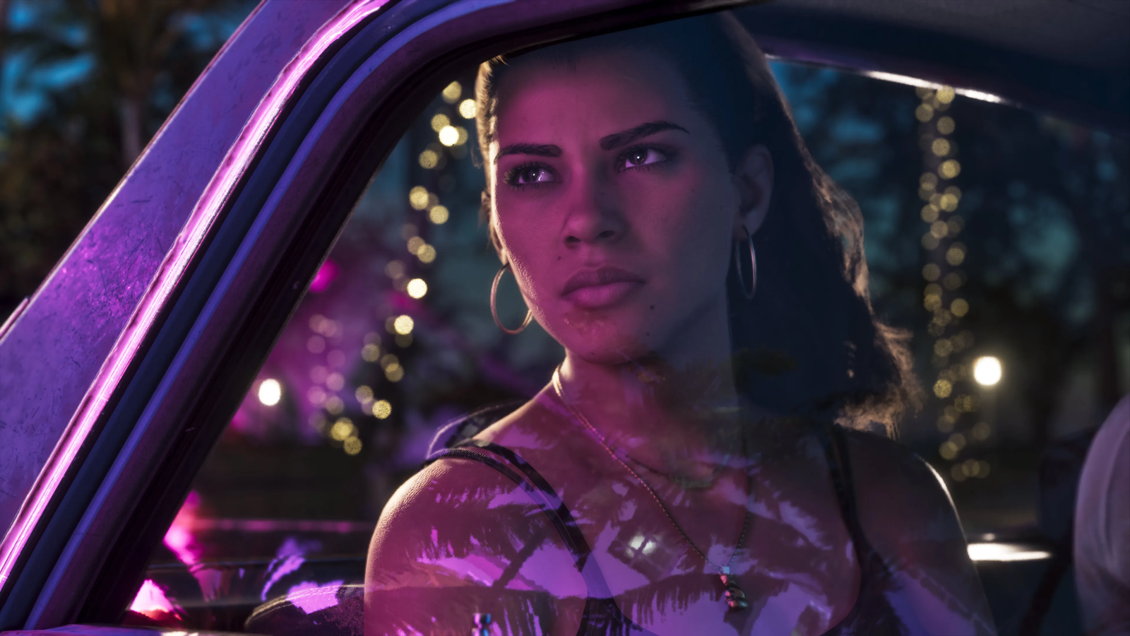 Lucia sits in a car at night under purple neon light in GTA 6, official screenshot
