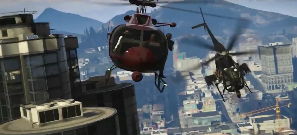 Two helicopters over downtown Los Santos during the Three's Company chase in GTA 5